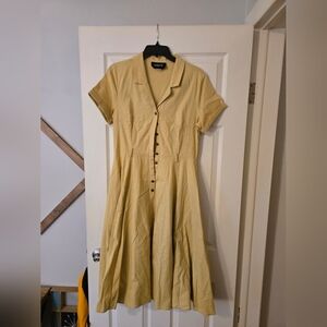 Collectif shirt dress is pale mustard yellow